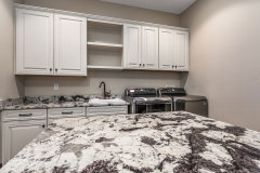 Unionlands Cabinetry Raised Panel Applied Molding Two Tone Black Painted With Marble Countertop