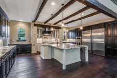 Unionlands Cabinetry Raised Panel Applied Molding Two Tone Black Painted With Marble Countertop