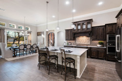 Unionlands Cabinetry Raised Panel Two Tone Maple Stain Kitchen Cabinet and White Painted Island Cabinet