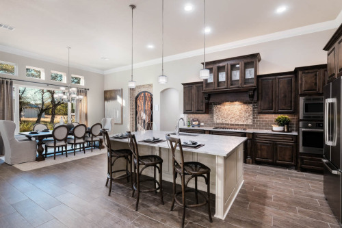 Unionlands Cabinetry Raised Panel Two Tone Maple Stain Kitchen Cabinet and White Painted Island Cabinet