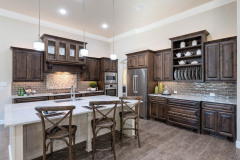 Unionlands Cabinetry Raised Panel Two Tone Maple Stain Kitchen Cabinet and White Painted Island Cabinet