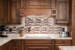 Unionlands Cabinetry Raised Panel Cherry Stain and Mullion Glass Door With White Painted Island Cabinet