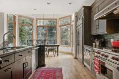 Unionlands Cabinetry Vintage Style Solid Wood Shaker Door Stain Kitchen Cabinet With Black Painted Shiplap Panel Granite Countertop Island Cabinets