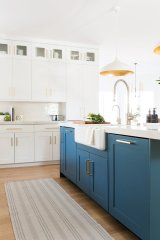 Unionlands Cabinetry White Kitchen With Gold Accents MDF White Shaker Panel Door And Blue Island with Luxury Countertops