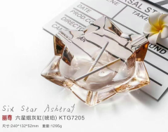 Six angle amber glass ashtray