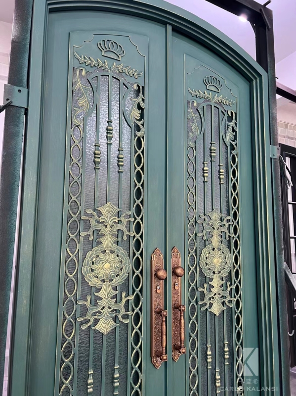 double wrought iron front door in green color