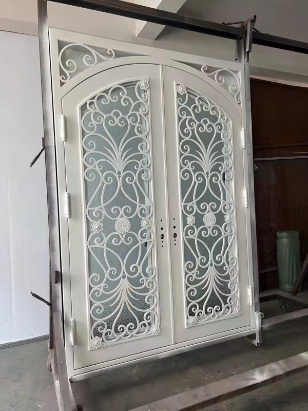 double wrought iron front door in white color