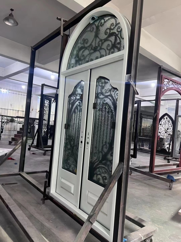 double wrought iron front door in white color