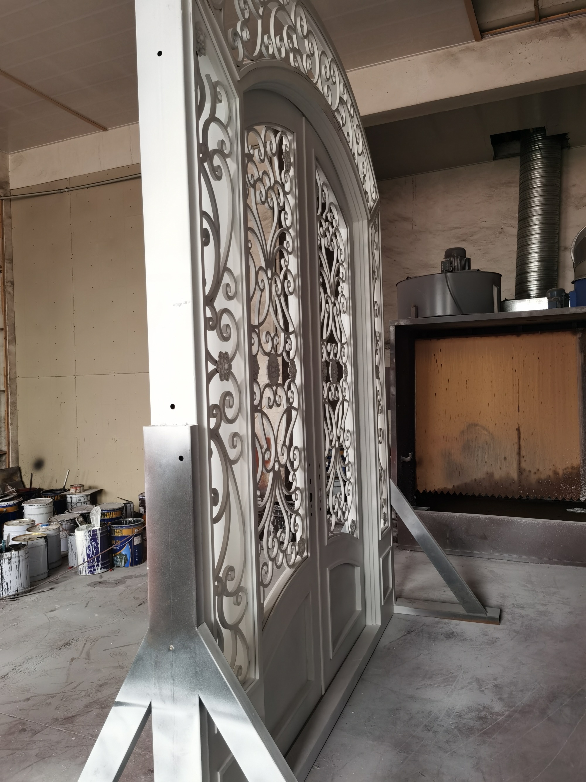 double wrought iron front door in white color