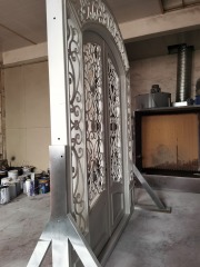 double wrought iron front door in white color