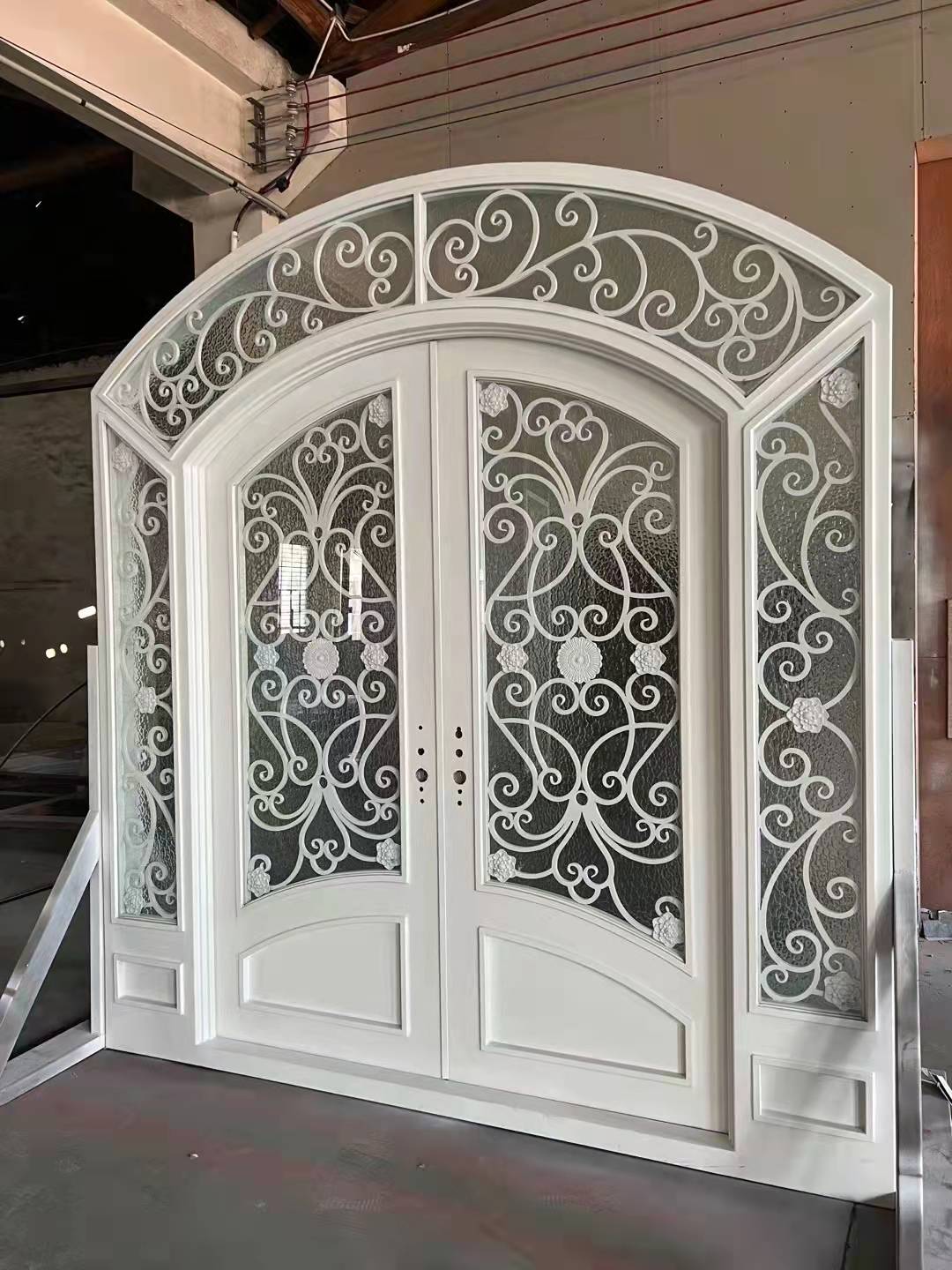 double wrought iron front door in white color