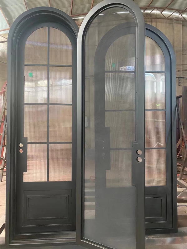 Single Arc top wrought iron door with glass