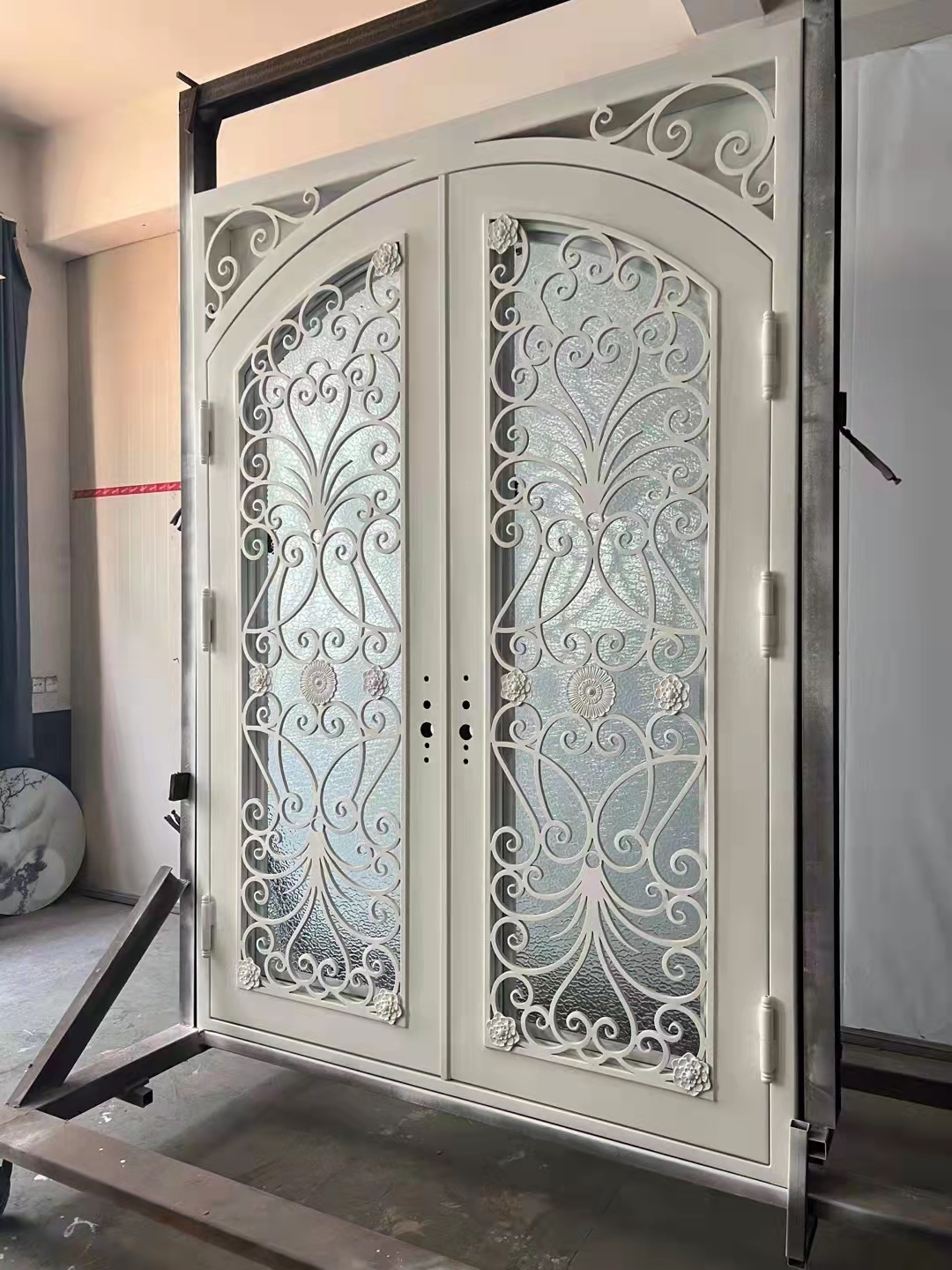 double wrought iron front door in white color