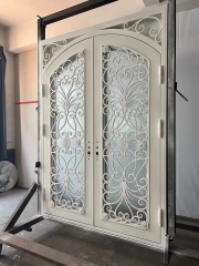 double wrought iron front door in white color