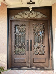 double wrought iron front door in brown color