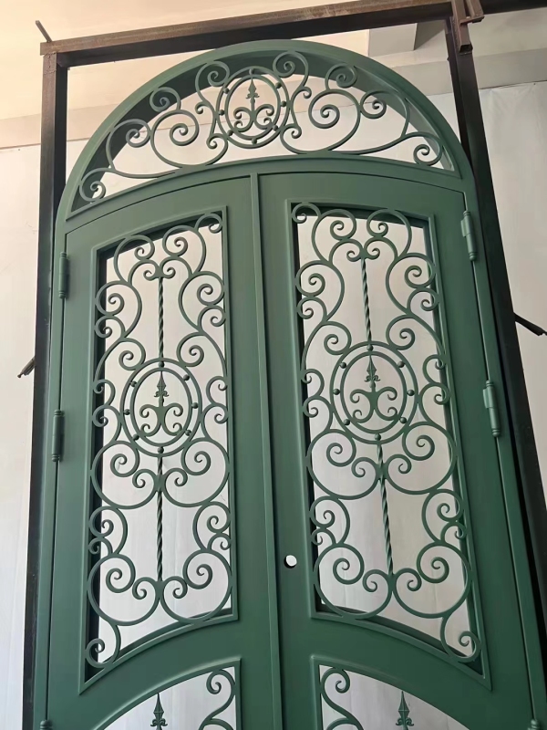 double wrought iron front door in green color