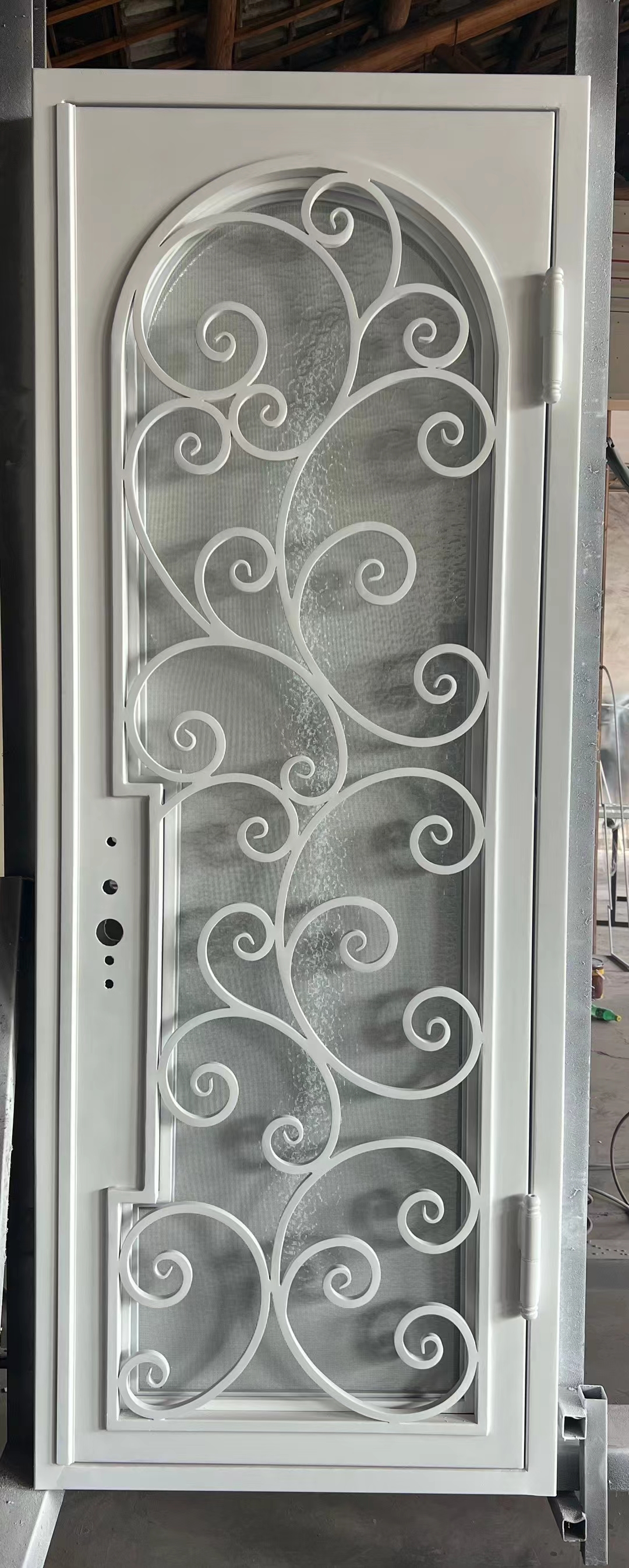 white wrought iron front door