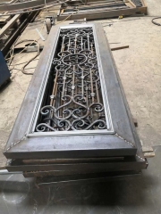 white wrought iron front door