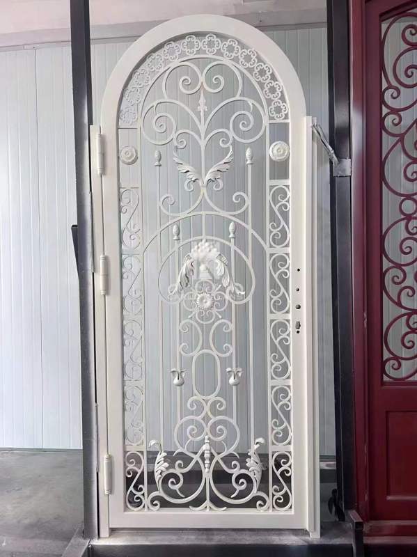 white wrought iron front door