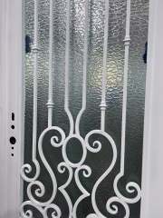 white wrought iron front door