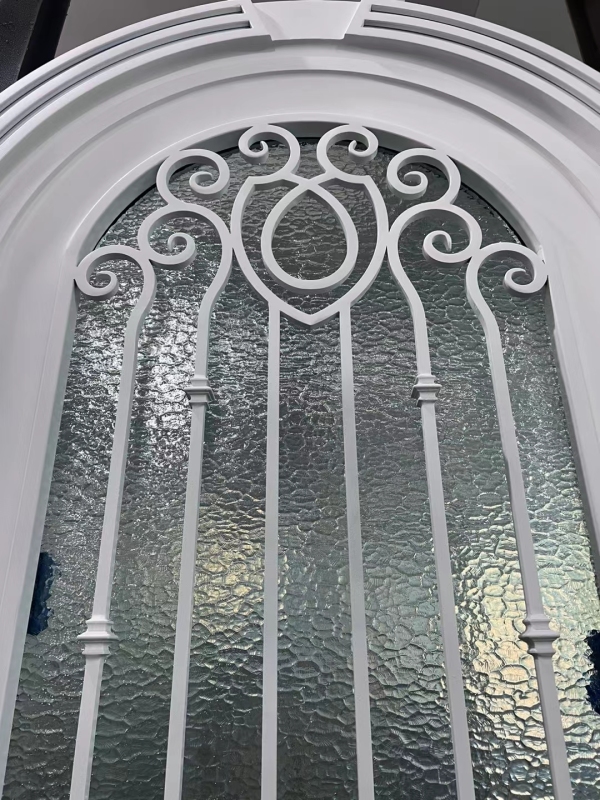 white wrought iron front door