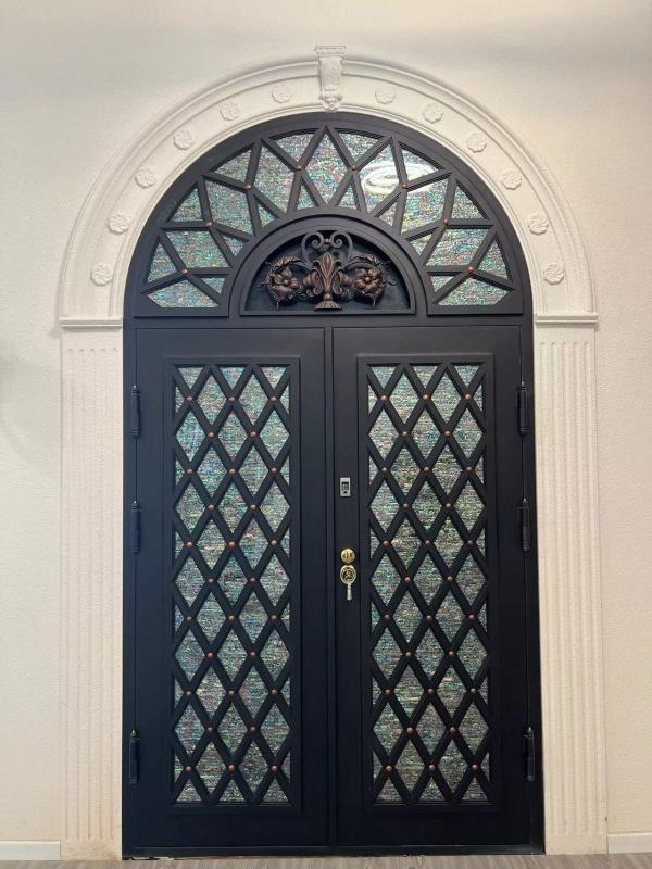 Double iron front door with Arc top