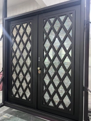 Double iron front door with Arc top