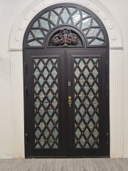 Double iron front door with Arc top