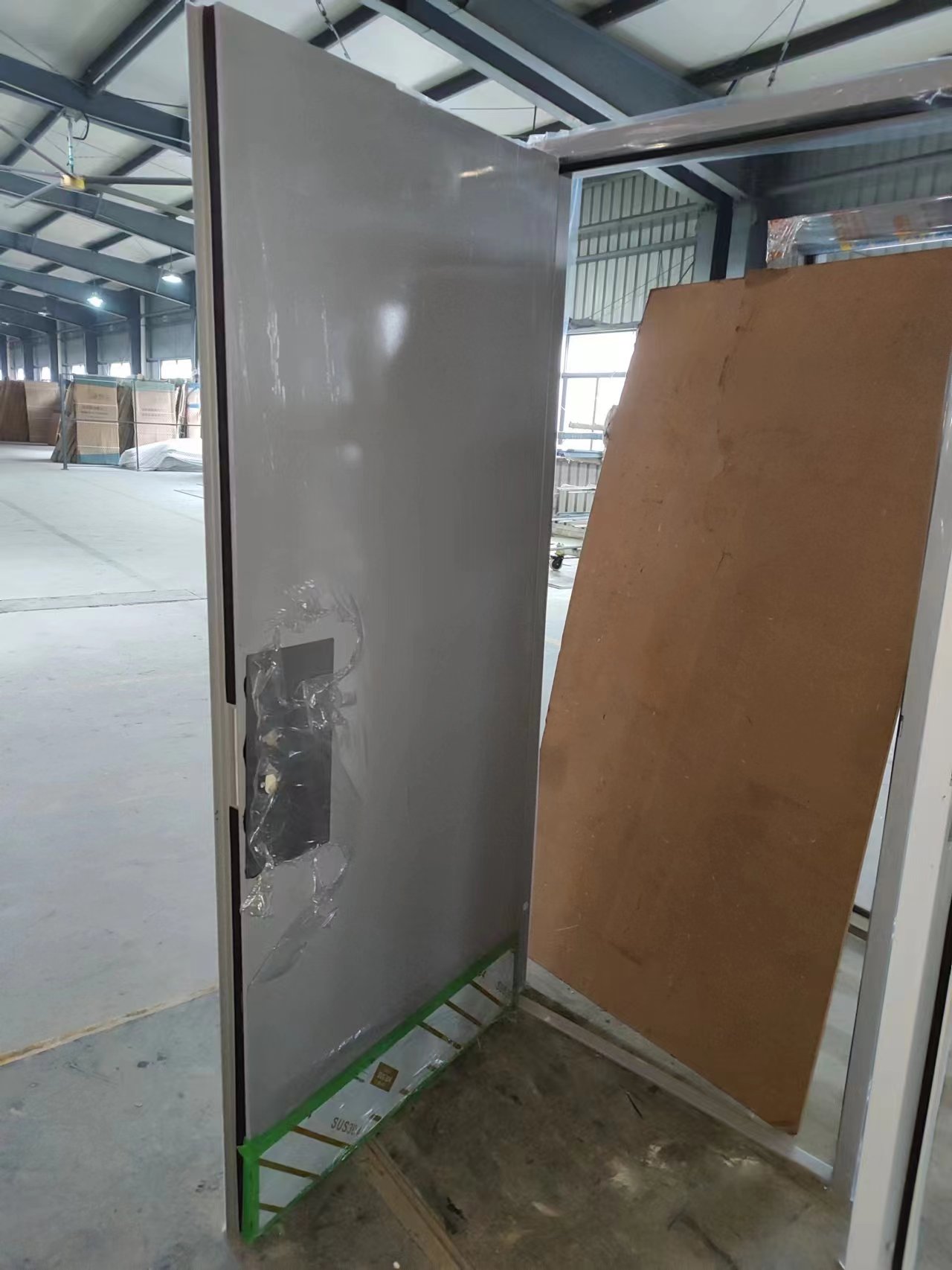 Knock down metal frame together with door panel for better container loading volumn