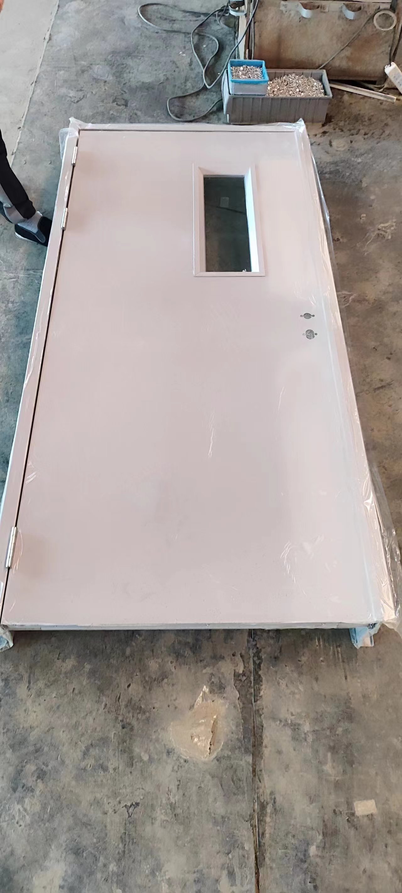 Knock down metal frame together with door panel for better container loading volumn