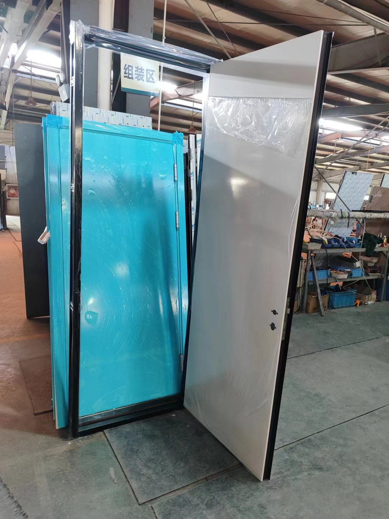 Knock down metal frame together with door panel for better container loading volumn