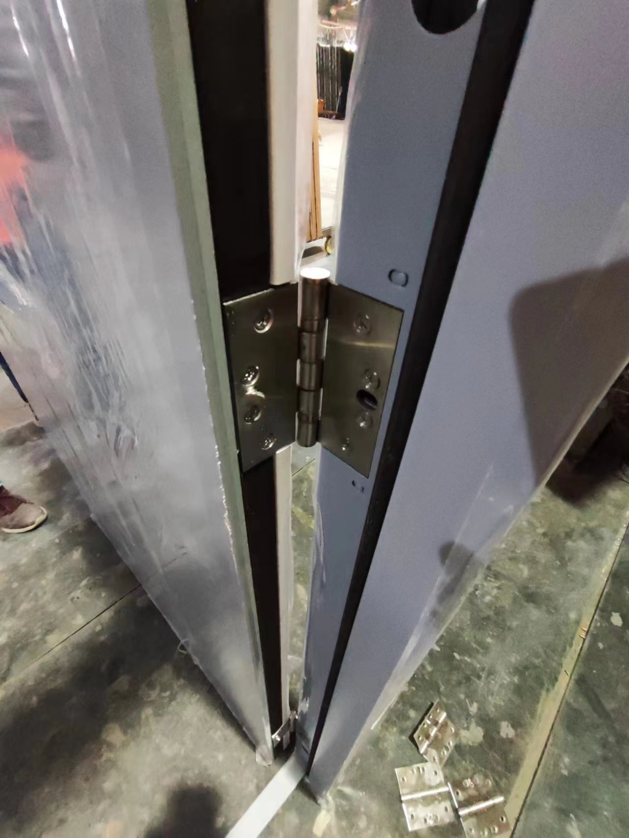 Knock down metal frame together with door panel for better container loading volumn