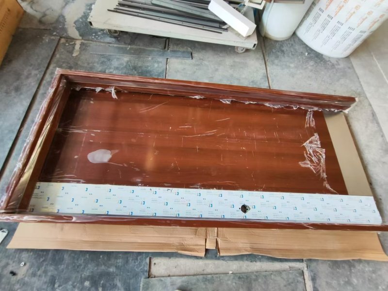 Wooden look UL fireproof steel doors with knock down metal frame with S.S side plate & kick plate