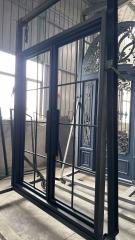 Double iron front glass door with transom