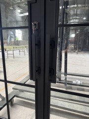 Double iron front glass door with transom