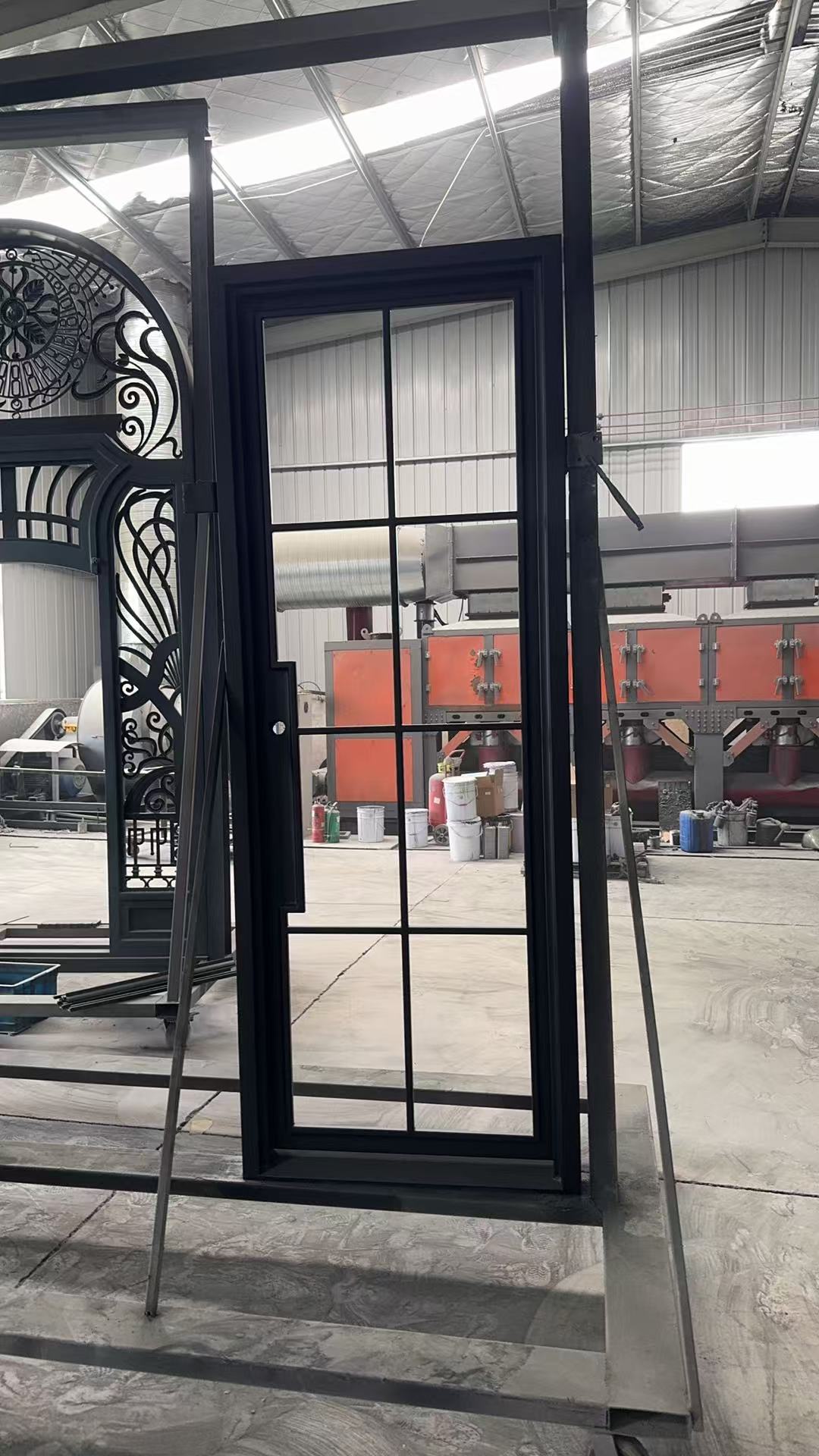 Double iron front glass door with transom