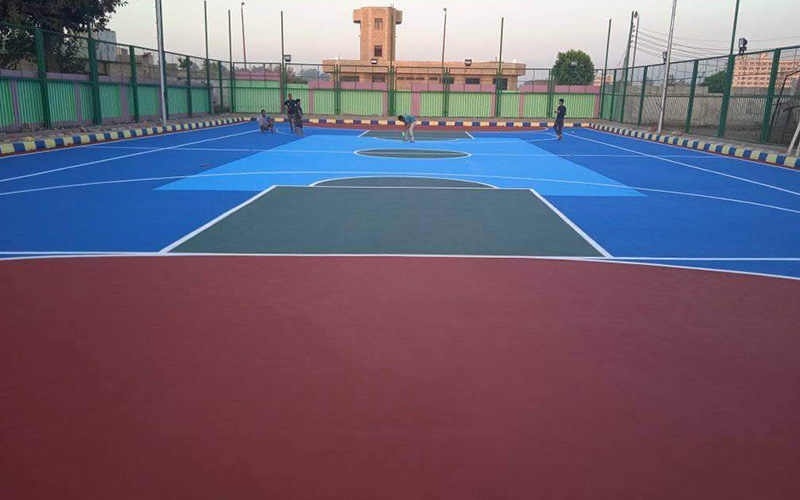 Why is the outdoor acrylic basketball court one of the most economical materials?