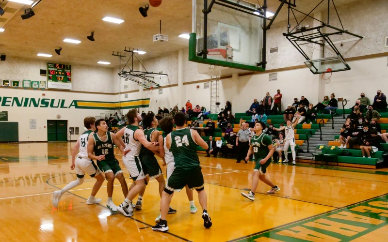 What kind of flooring material should be used for basketball courts?