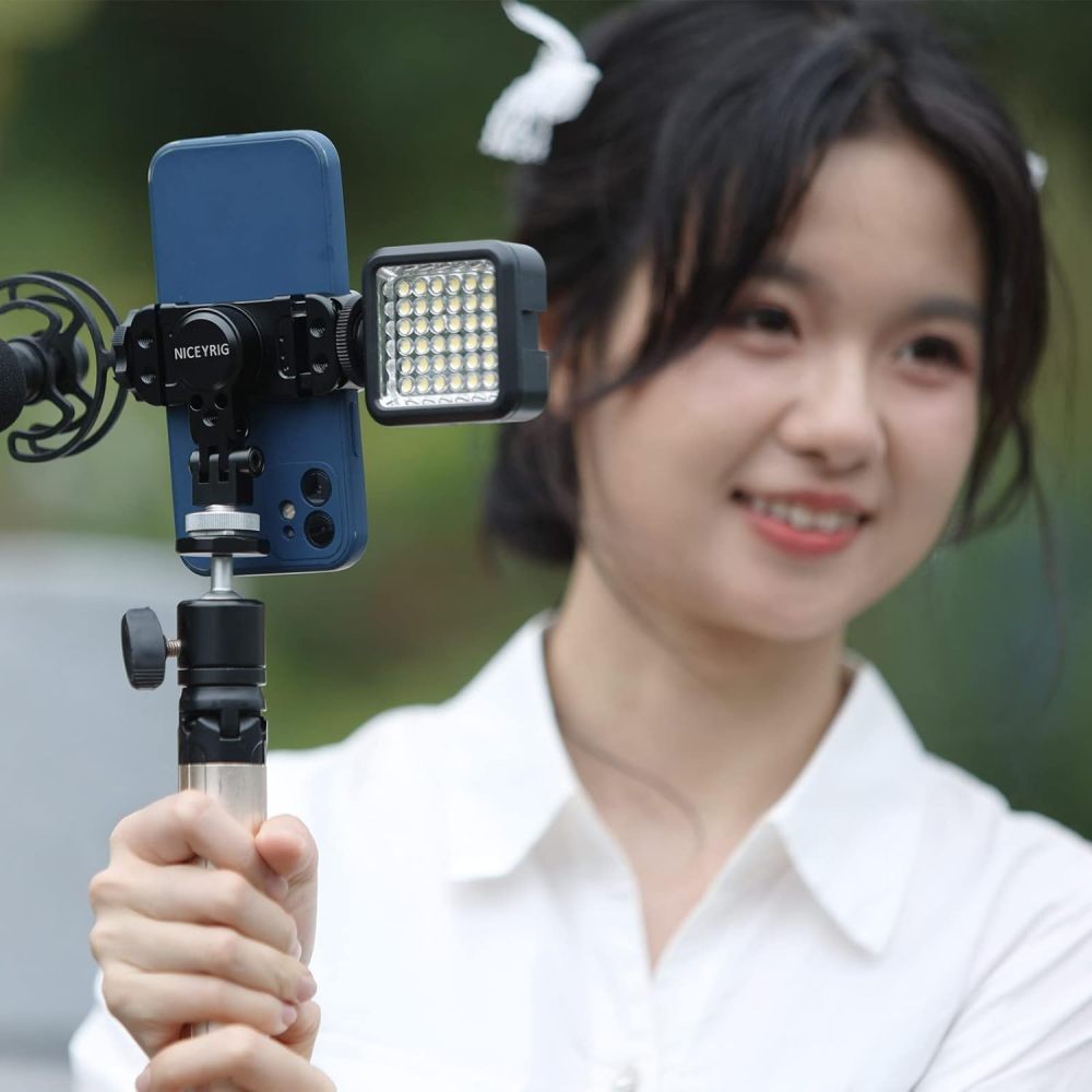 NICEYRIG Aluminum Tripod Mount Holder for iPhone 16/15/14/13/12/11 Pro 6.1'', Pro Max 6.7'', Vlog Vlogging Smartphone Video Clamp with Cold Shoe Mount for DSLR Camera - 515