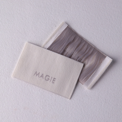 Custom woven labels with personalized logos for clothing brands