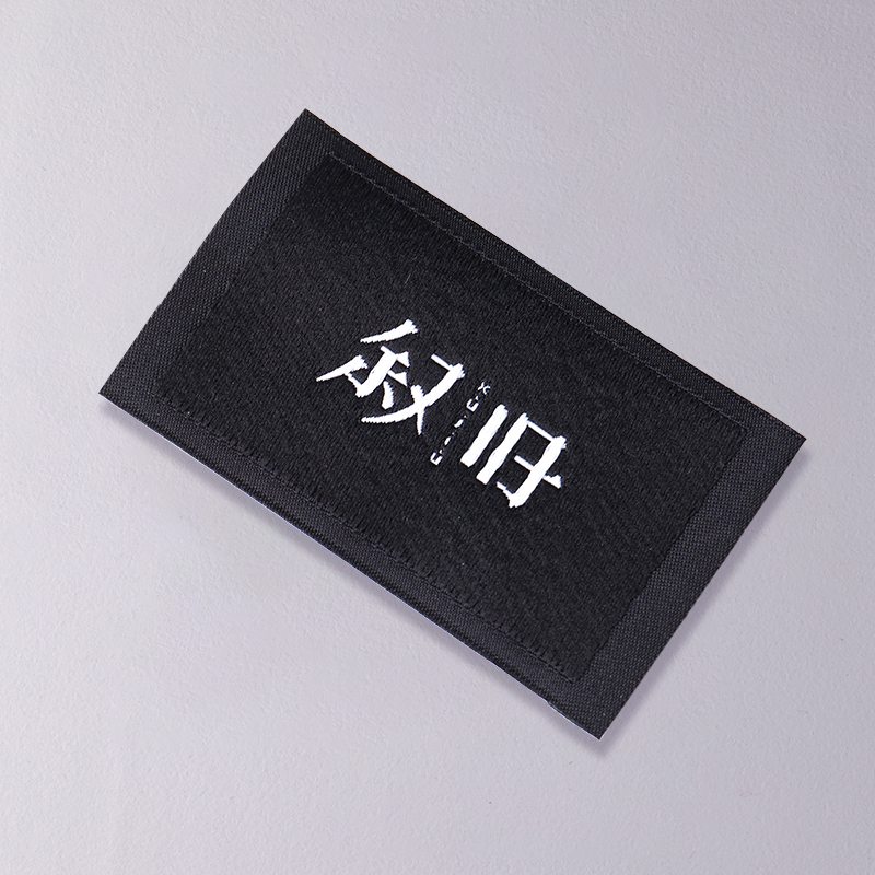 Custom woven labels with personalized logos for clothing brands