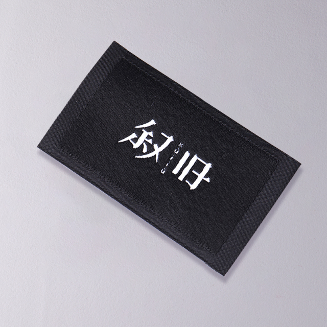 Custom woven labels with personalized logos for clothing brands