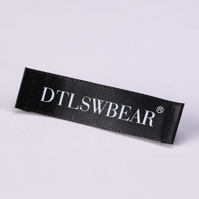 Black satin labels