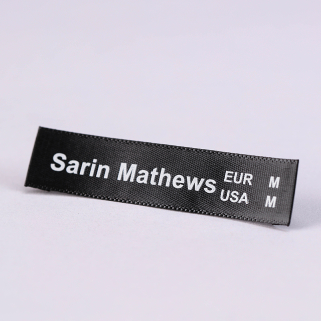 Black satin labels