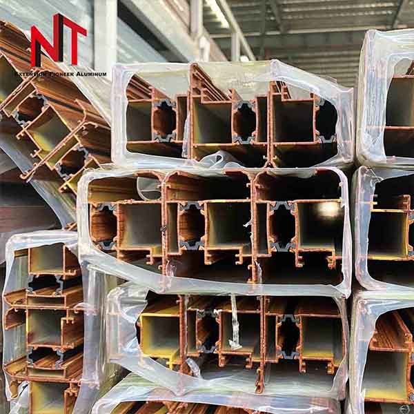 Wood grain heat transfer film for aluminum