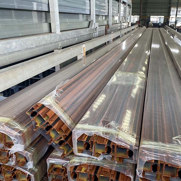 Wood grain heat transfer film for aluminum