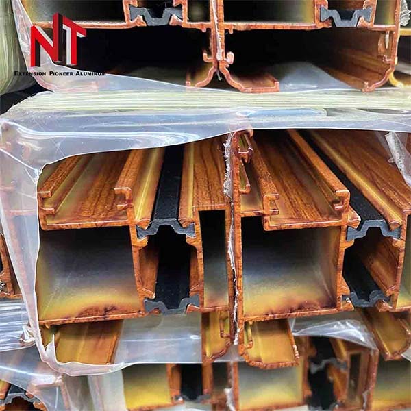 Wood grain heat transfer film for aluminum