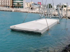 Concrete pontoon bridge