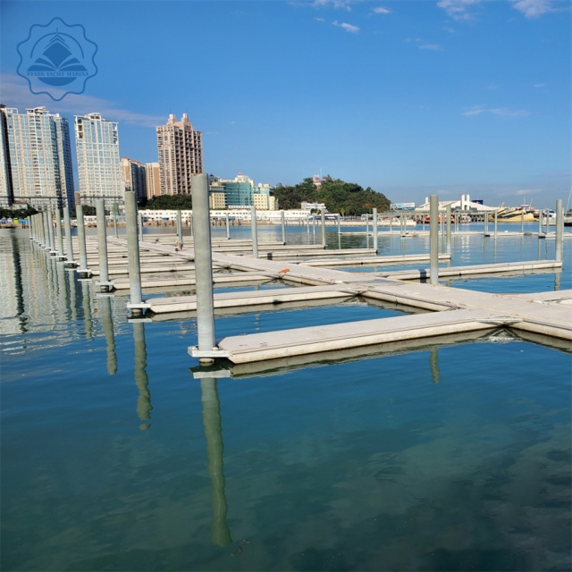 Concrete floating bridge