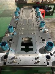 Cruciform lamination high speed carbide die